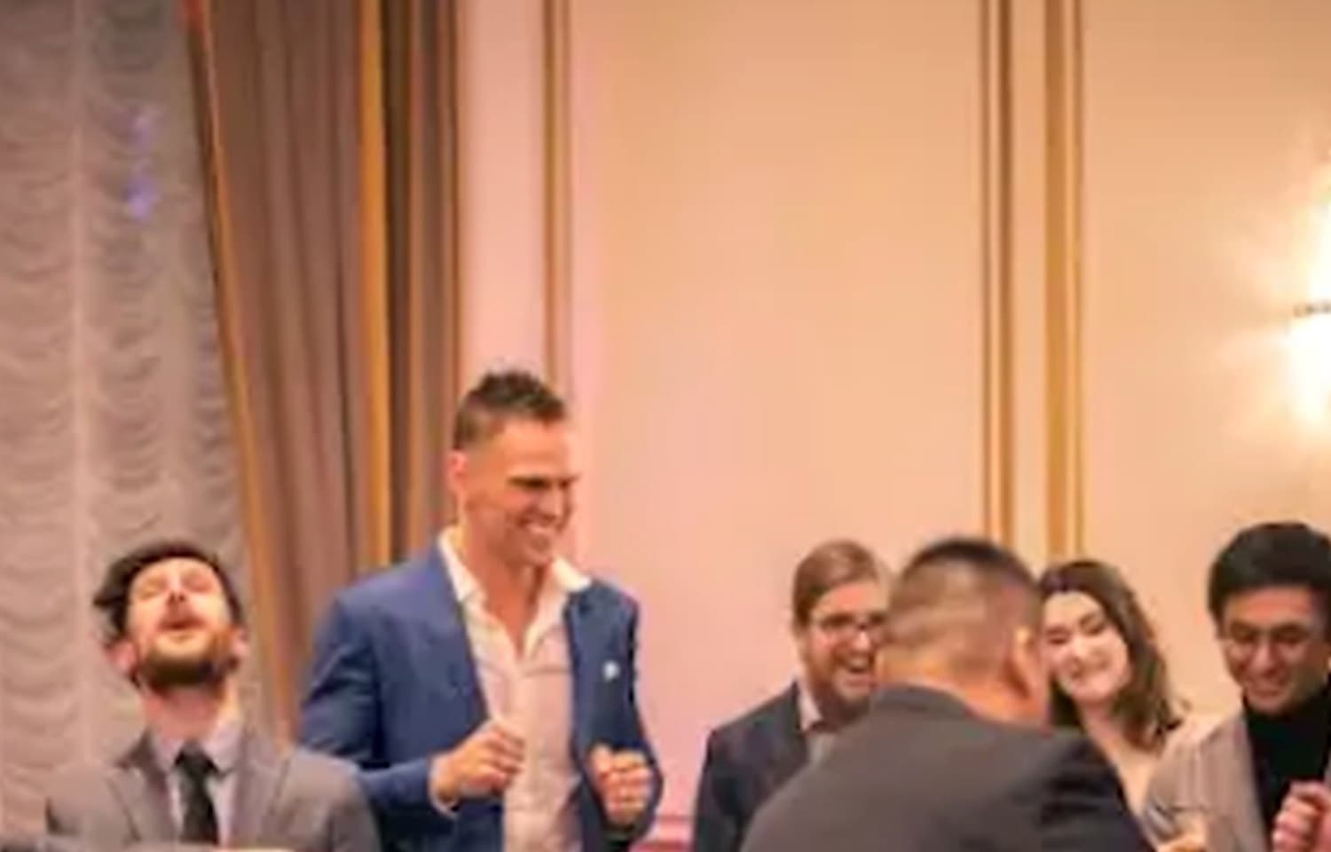 Event guests reacting to close-up magic