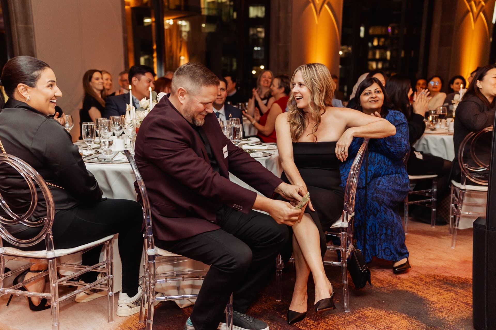Event guests reacting to close-up magic