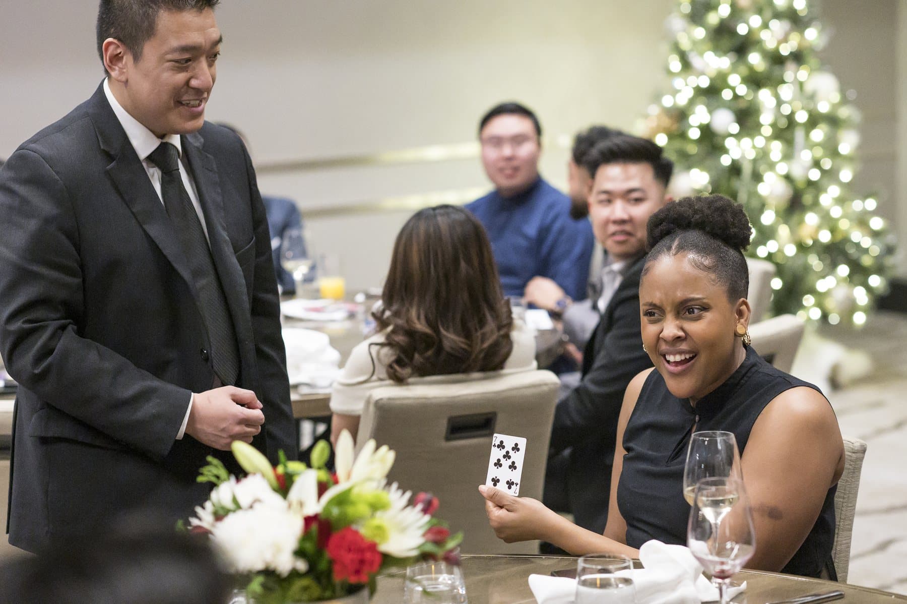 Event guests reacting to close-up magic