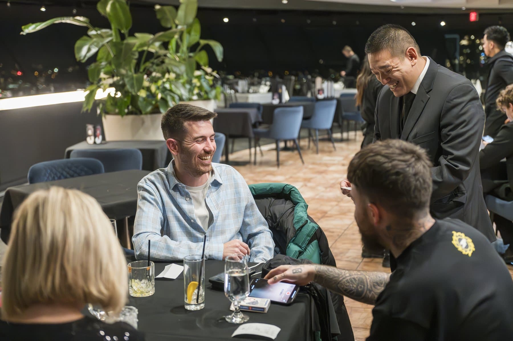 Event guests reacting to close-up magic
