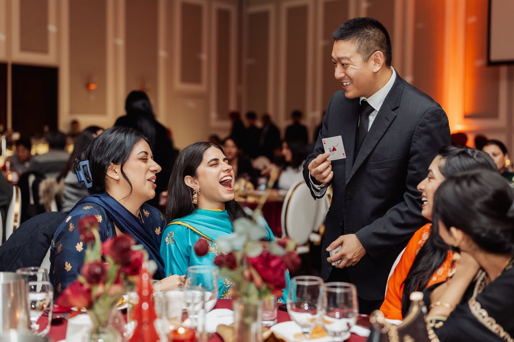Event guests reacting to close-up magic