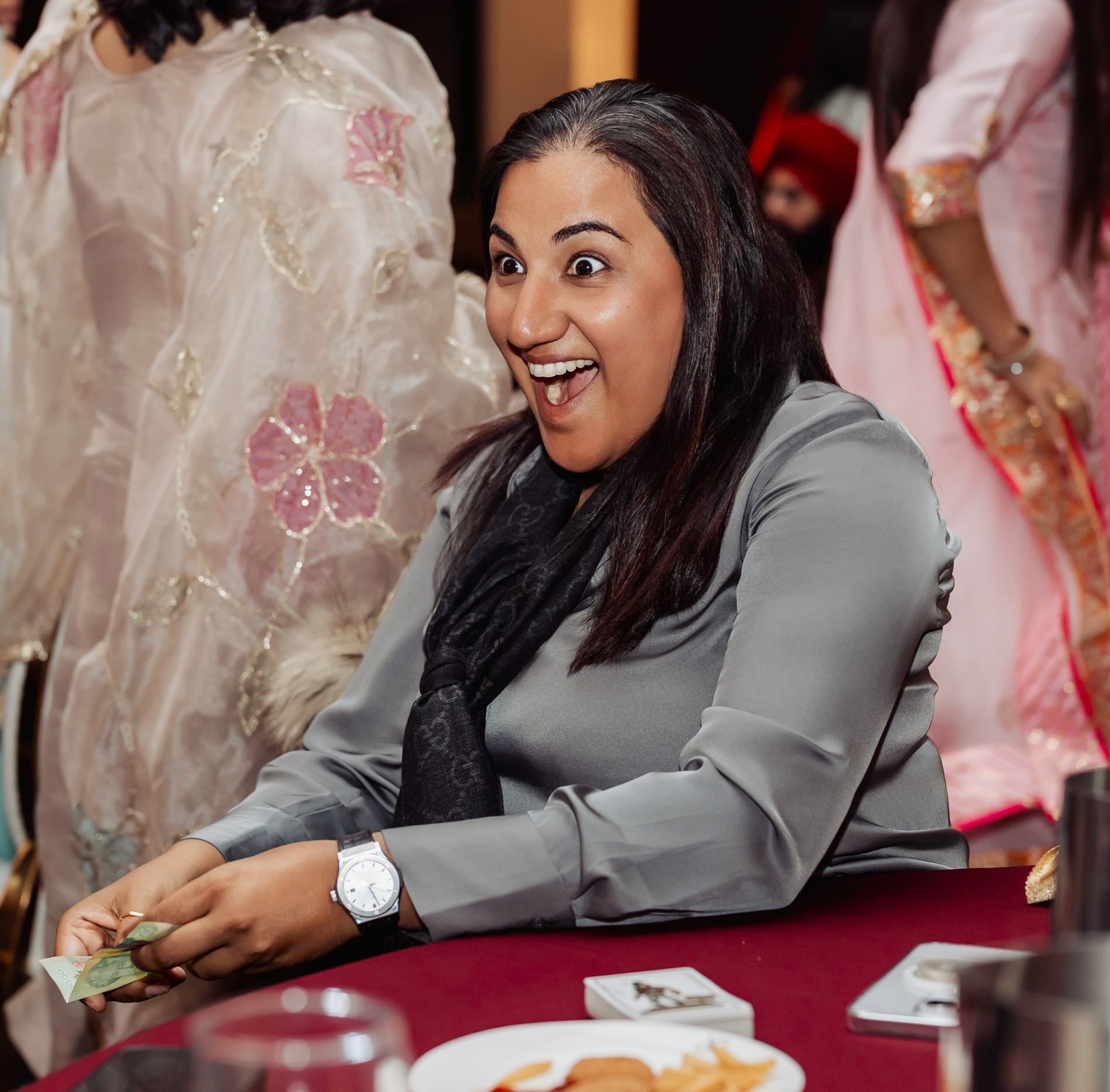 Event guests reacting to close-up magic