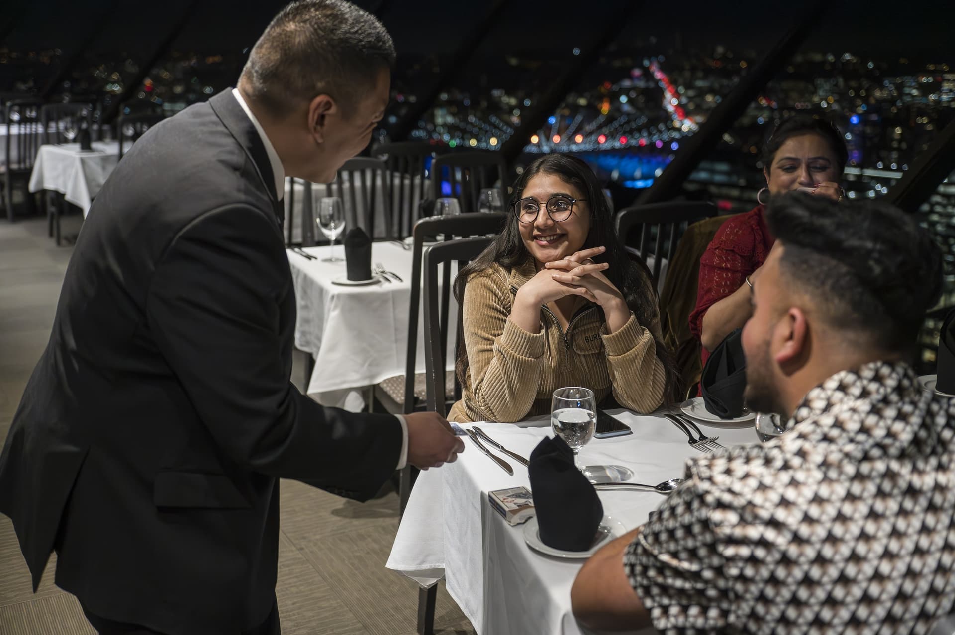Event guests reacting to close-up magic